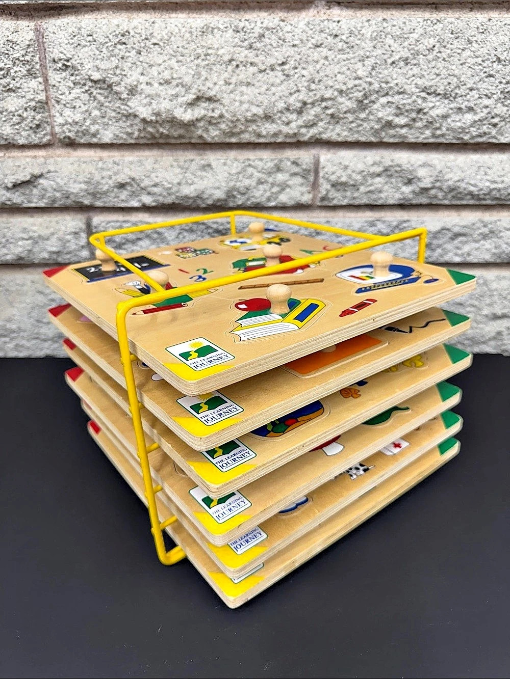 The Learning Journey Wooden Peg Puzzle Set of 6 with Wire Storage Rack
